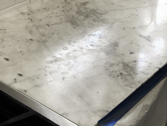 Prior to honing, this marble had many highly visible etch marks from everyday use.
