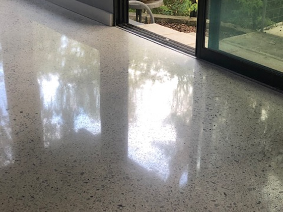 The terrazzo floor after it has been polished with a natural polish.