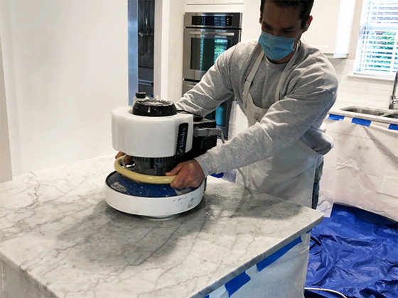 Using a marble countertop polishing machine