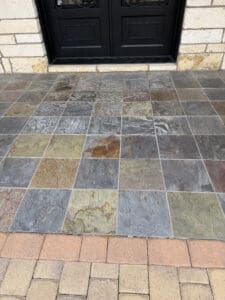 washed-out-exterior-slate-tile-before-cleaning Washed out and chalky exterior slate tile before professional cleaning and sealing